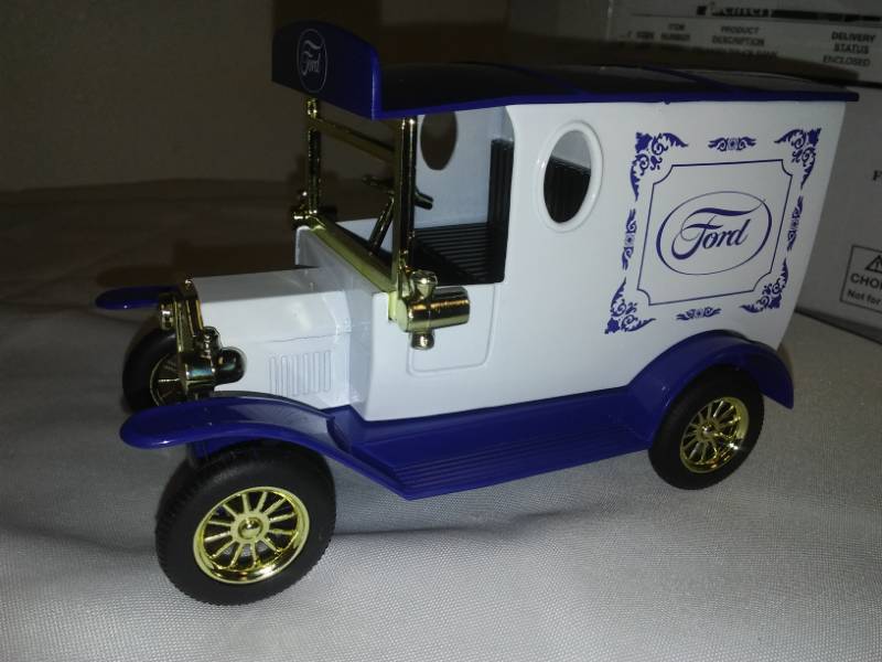 lot 156 image: 20s Ford delivery truck bank with keys.