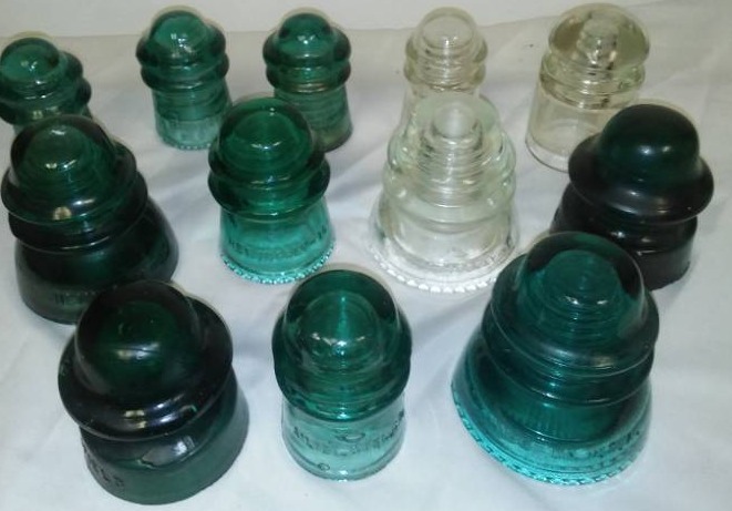 lot 165 image: 12 electrical glass insulators.