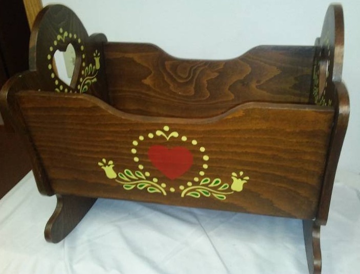 lot 191 image: Handmade wood bassinet,