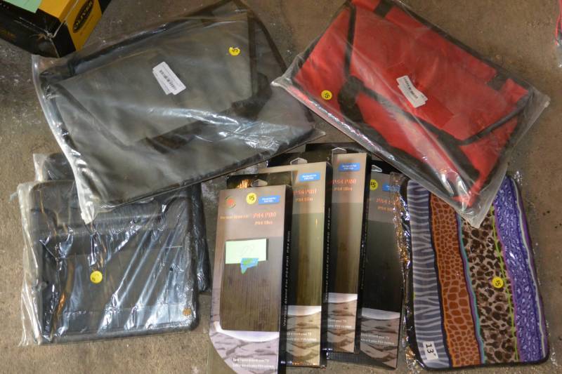 lot 60 image: PS4 Cases, Laptop cases all new...
