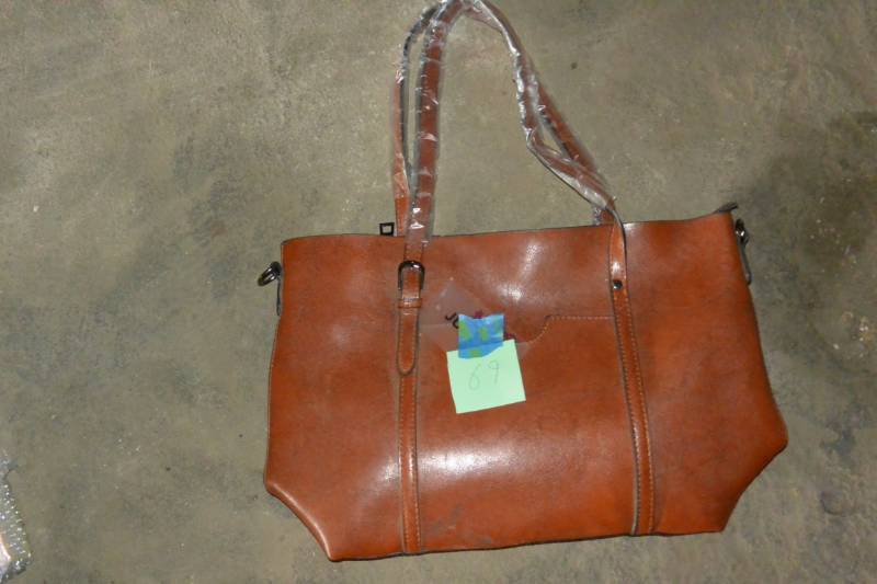 lot 69 image: Leather purse, new...