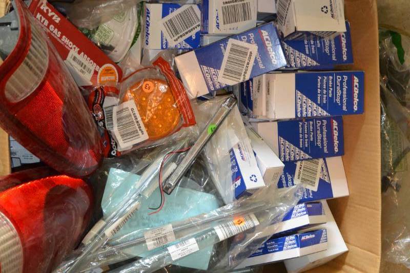 lot 132 image: Car parts, most are new, 3 used...