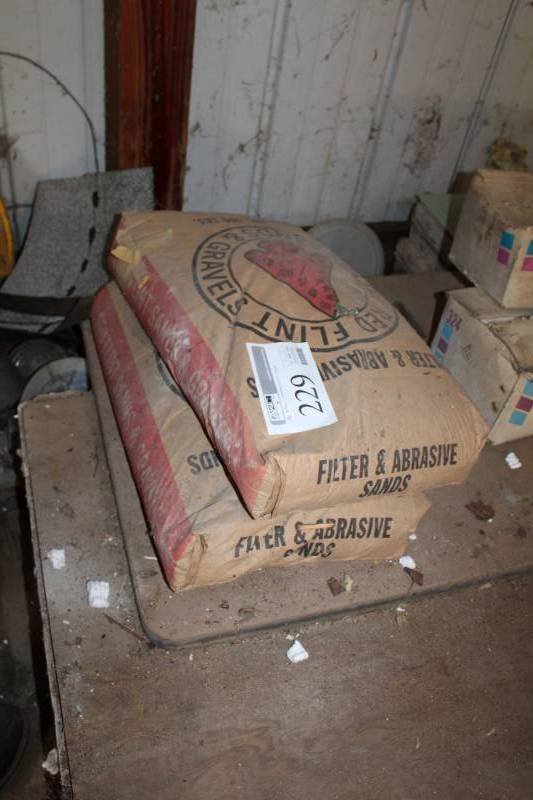 lot 229 image: Lot of (2) 100lbs. Bags of Red Flint Filter Sands & Gravel Filter & Abrasive Sands