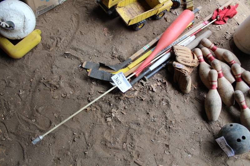 lot 362 image: Vintage Sporting Equipment - Hockey Sticks, Plastic Bat, Baseball Gloves, Bats, And More