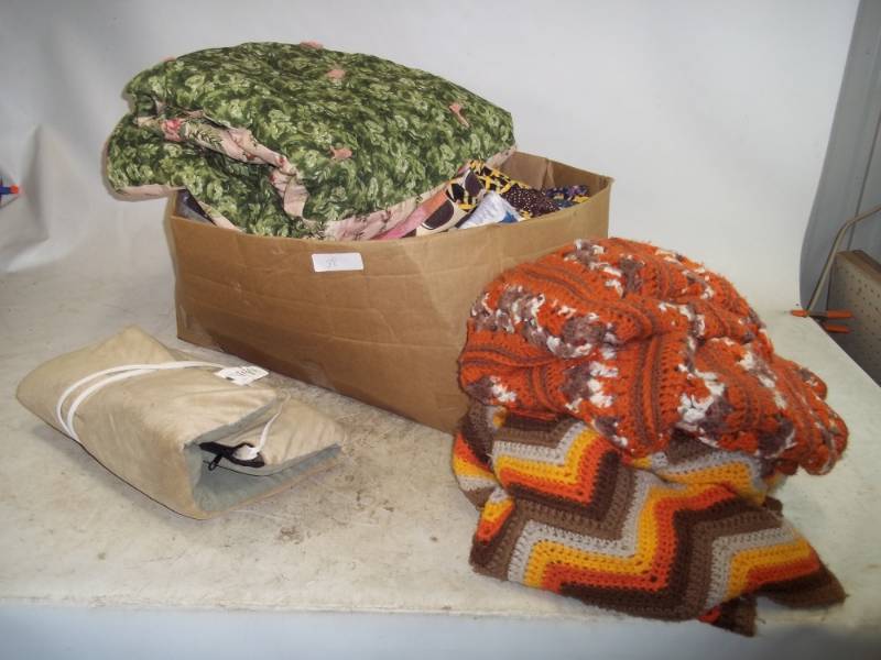 Quilts and heated pet mat