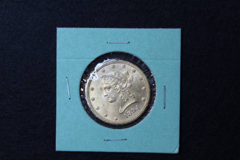 lot 5 image: 1894 $10.00 Gold Liberty Eagle Coin in Protective Sleeve