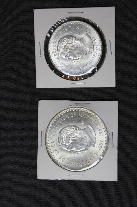 lot 24 image: Lot of (2) 1957 Mexico Centennial Peso (Juarez)