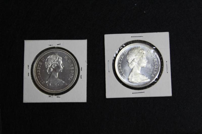 lot 22 image: Lot of (2) 1965 - 1970  CANADA DOLLAR Coins,