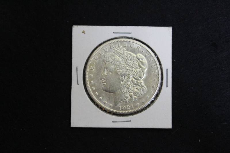 lot 49 image: 1921 P Morgan Silver Dollars in Collector Sleeve
