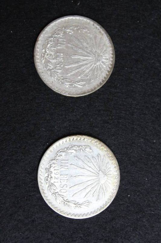lot 77 image: Lot of (2) 1921 Pesos Coins