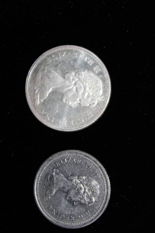 lot 120 image: Lot of (2) 1965 and 1974   CANADA DOLLAR Coins,