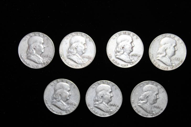 lot 114 image: Lot of (7) Pre 1964 Franklin Half Dollars