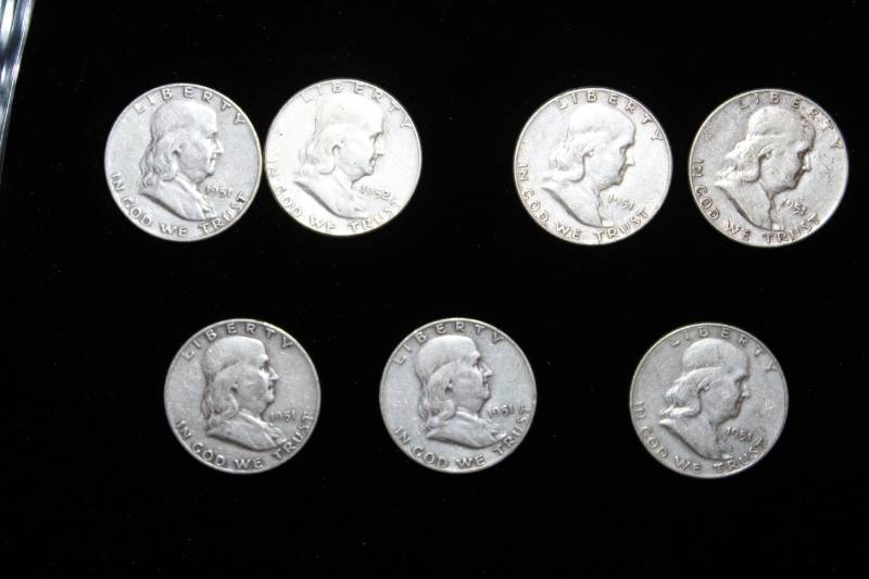 lot 112 image: Lot of (7) Pre 1964 Franklin Half Dollars