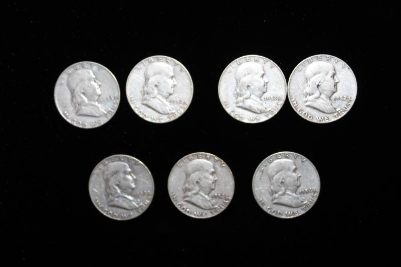 lot 111 image: Lot of (7) Pre 1964 Franklin Half Dollars