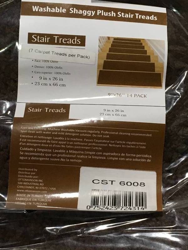 lot 57 image: OTTOMANSON Comfort Collection Brown 9 in. x 26 in. Rubber Back Plush Stair Tread (Set of 7) not used