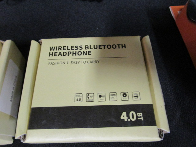 lot 91 image: Bluetooth Headphones, MP3 Player, Heartrate Watch