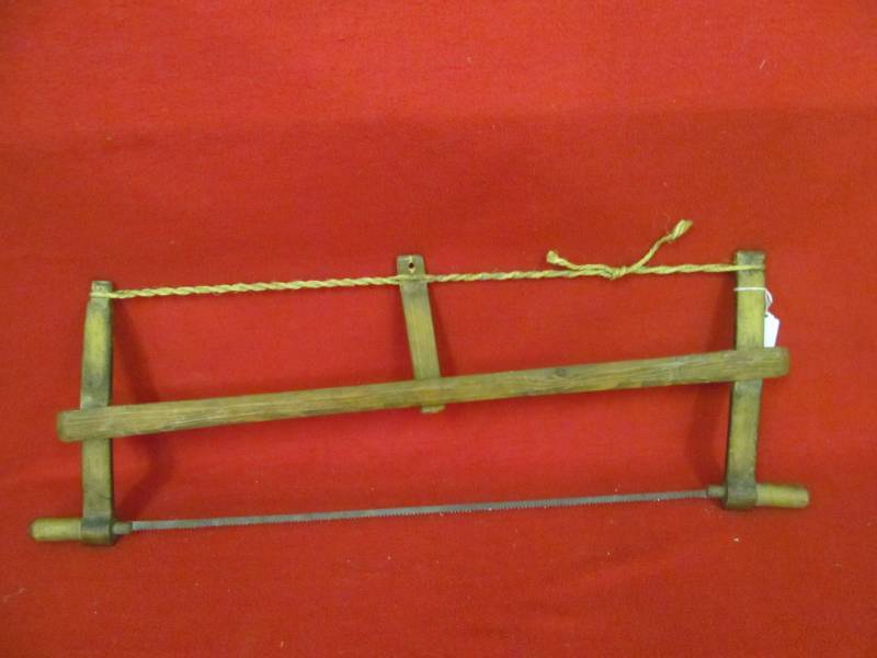 lot 84 image: vintage bow saw