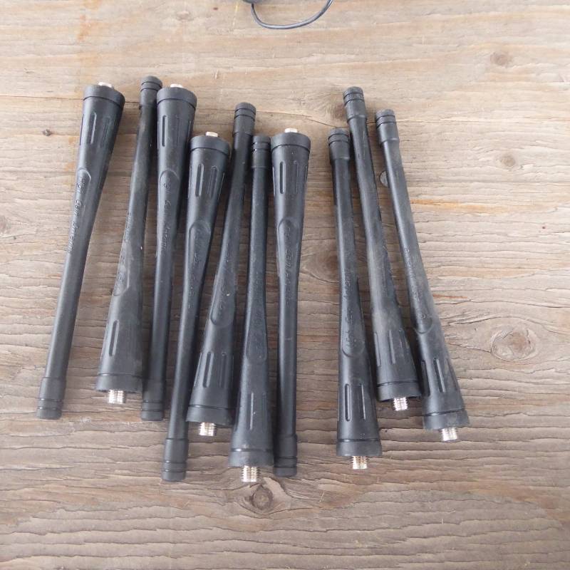lot 61 image: Lot of Radio Chargers, Ear Piece, and Extra Antennas