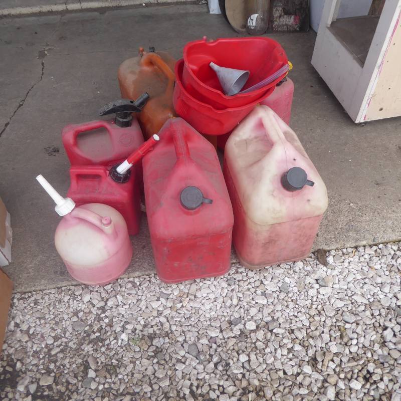 lot 71 image: Lot of Seven Gas Cans and Three Funnels