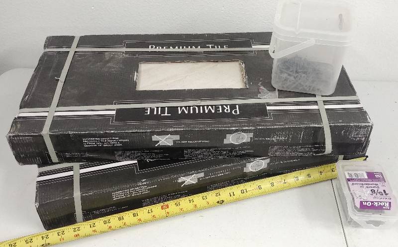 lot 65 image: 16 24x12 Premium Tiles  fastners