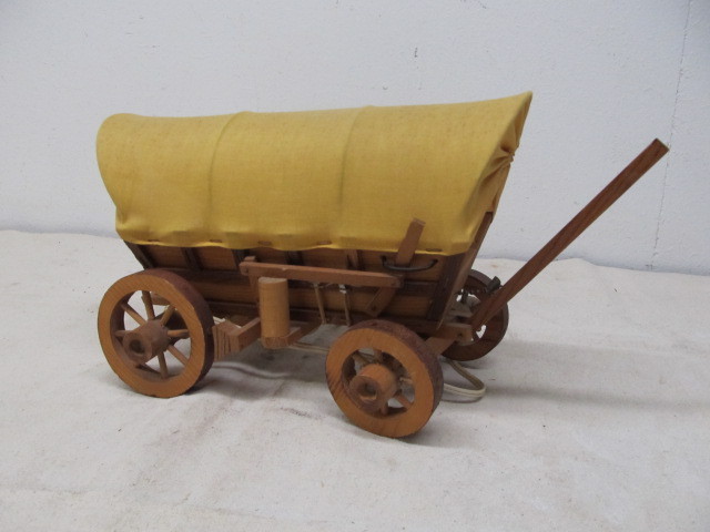 lot 102 image: Vintage Wooden Covered Wagon Lamp