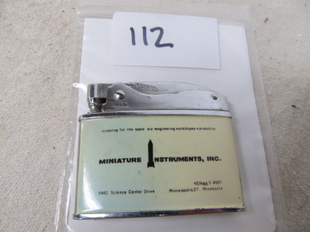 lot 112 image: Vintage MINIATURE PRODUCTS Space Engineering Advertising Cigarette Lighter