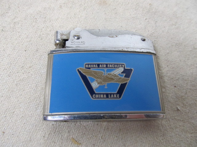 lot 113 image: Vintage NAVAL AIR FACILITY China Lake Advertising Cigarette Lighter