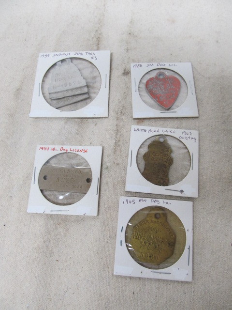 lot 153 image: Group of Vintage Dog Collar Tags