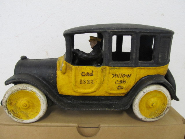 lot 161 image: Cast Iron Yellow Taxi Cab Toy by Dept 56