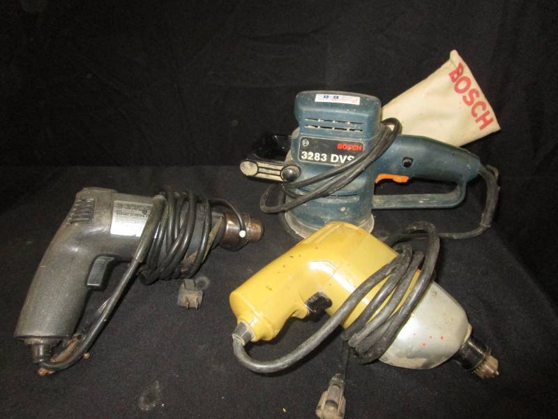 lot 15 image: Two drills and a sander