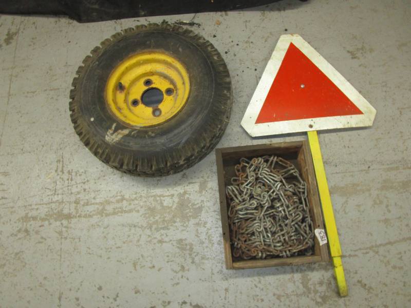 lot 89 image: 30x6 tire chains, 8 trailer wheel and tire and slow veh sign