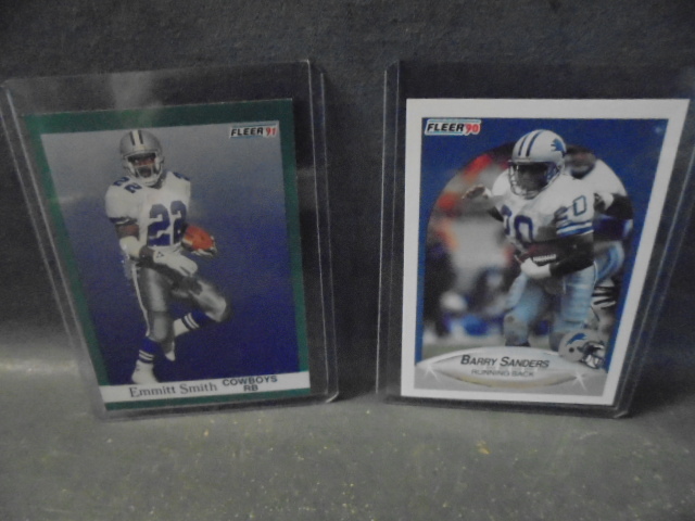 lot 14 image: Barry Sanders and Emmitt Smith Football Rookie Cards