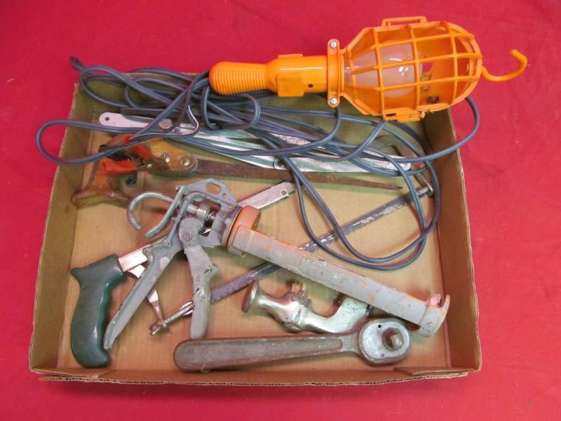 lot 44 image: Trouble light, Hacksaw, Caulking gun, Wrench