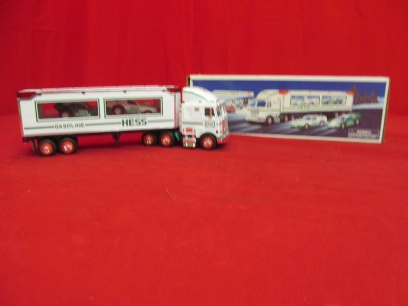 lot 67 image: Toy Truck and Racers, headlights and tail lights, truck battery power (Hess)