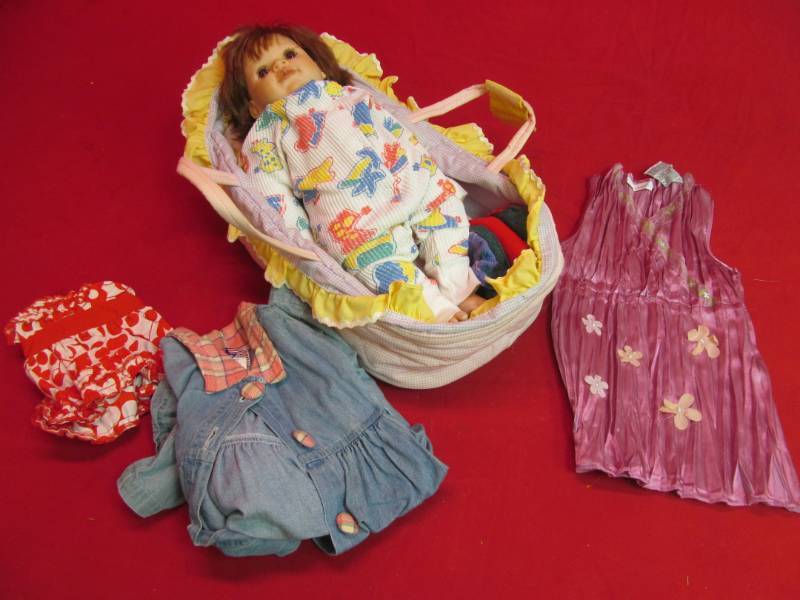 lot 97 image: doll and outfits