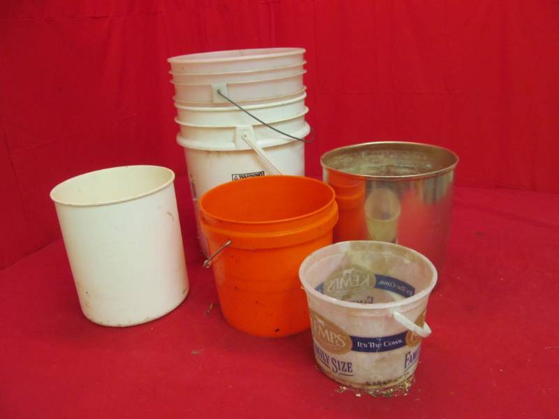 lot 106 image: 2- 5 gal buckets, 2 other buckets, 1 metal waste basket