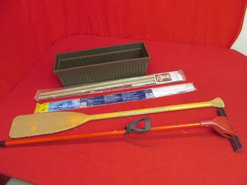 lot 166 image: mop handle, canoe paddle, steel door weather stripping, window box