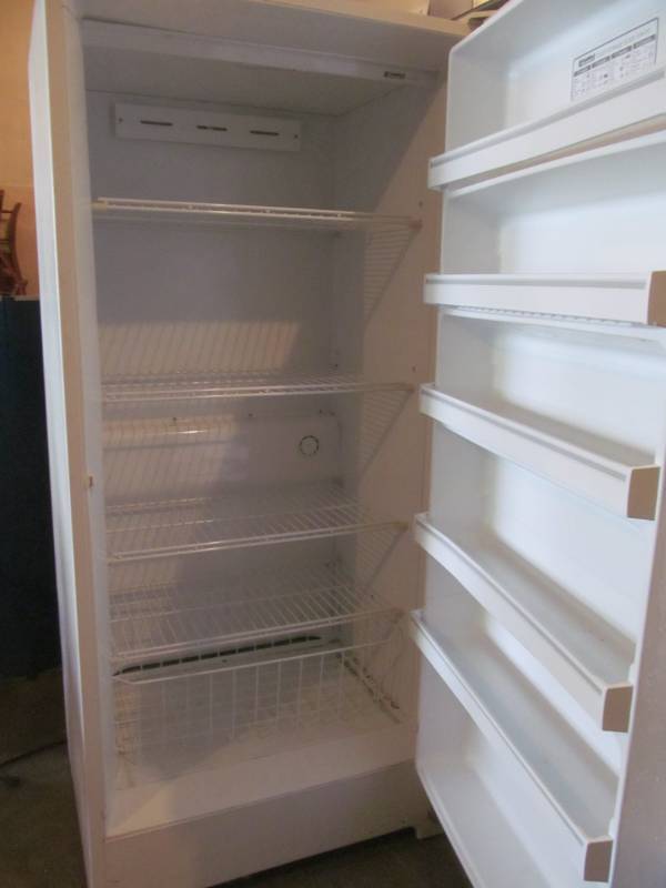 lot 180 image: Kenmore stand up freezer (70x28x32)