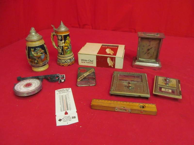 lot 202 image: Variety of Vintage Collectibles (mailbox doors, cigar boxes, Wurttiemberg Vintage clock, tobacco tins)