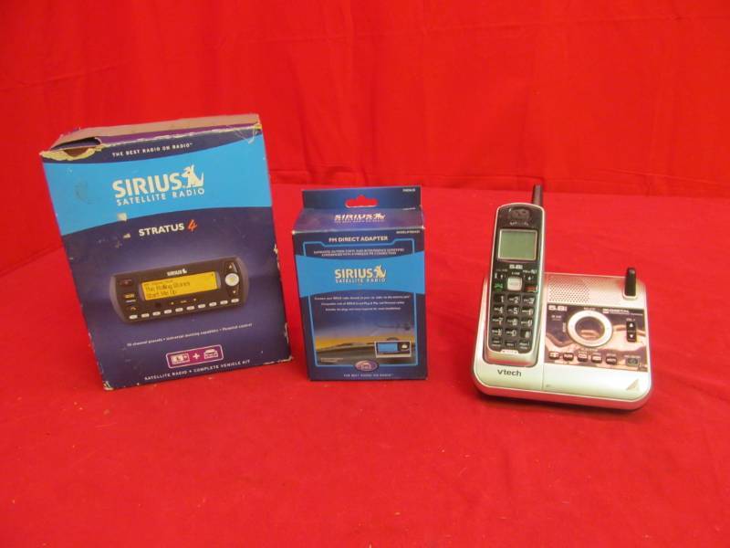 lot 203 image: Vtech cordless phone, Sirius satellite radio, Sirius FM direct adapter