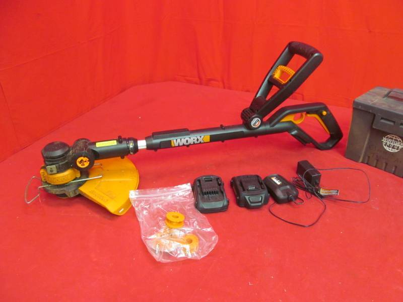 lot 223 image: Worz weed whip with 2 20 volt batteries