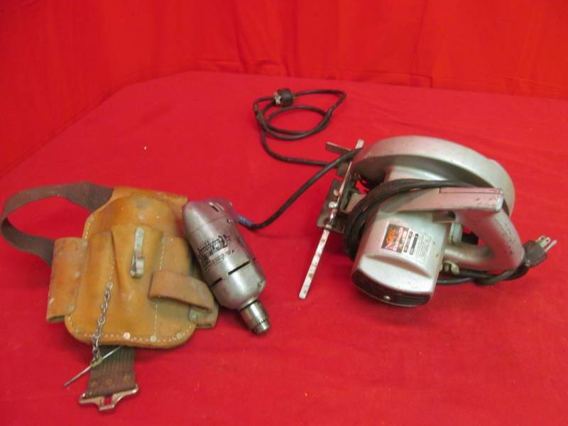 lot 227 image: Skil Saw (model 534), Black & Decker drill, tool belt