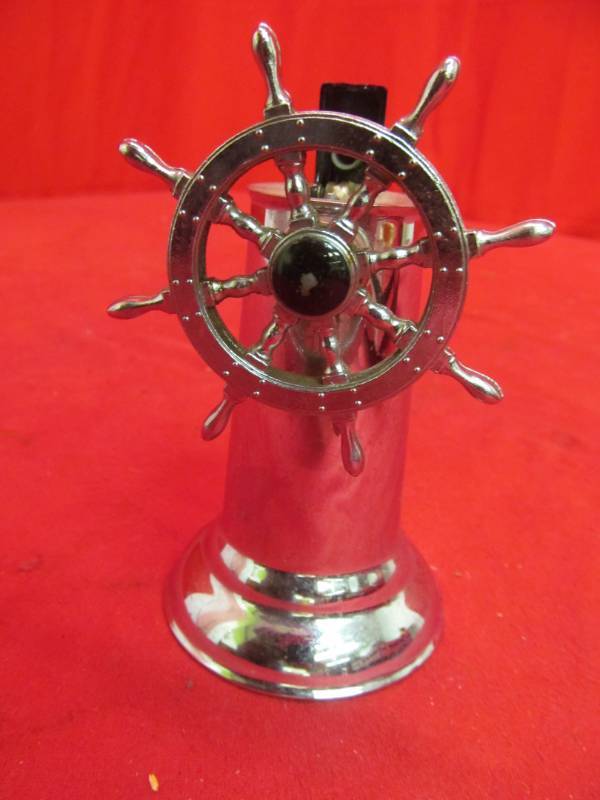 lot 279 image: Ships wheel lighter