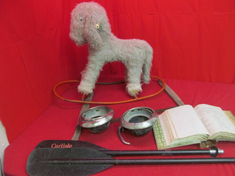 lot 258 image: Rocking dog, Varlisle paddle, vintage car parts, antique saw