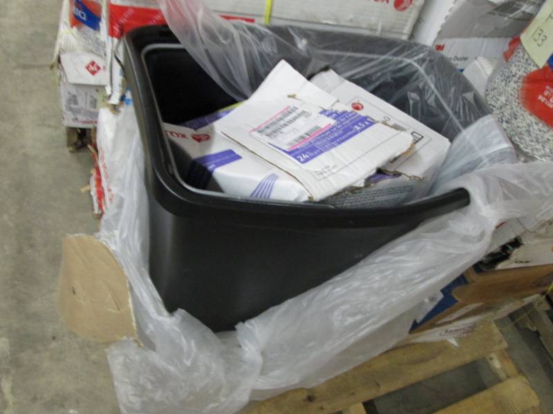 Waste Bin Containg damaged case of ...
