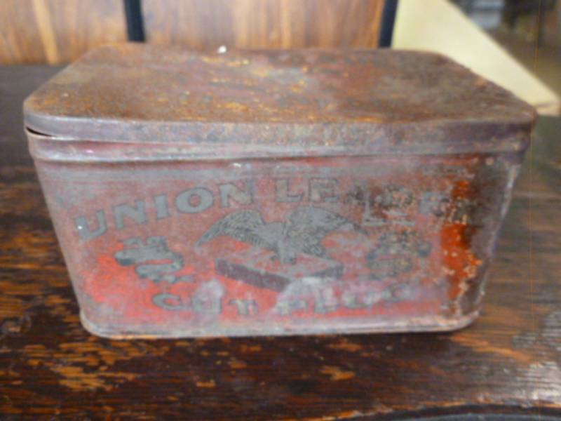 lot 83 image: Antique Tobacco Can