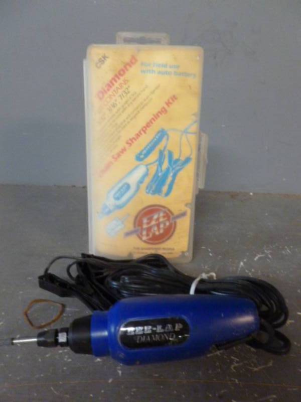lot 122 image: Chain Saw Sharpening Kit