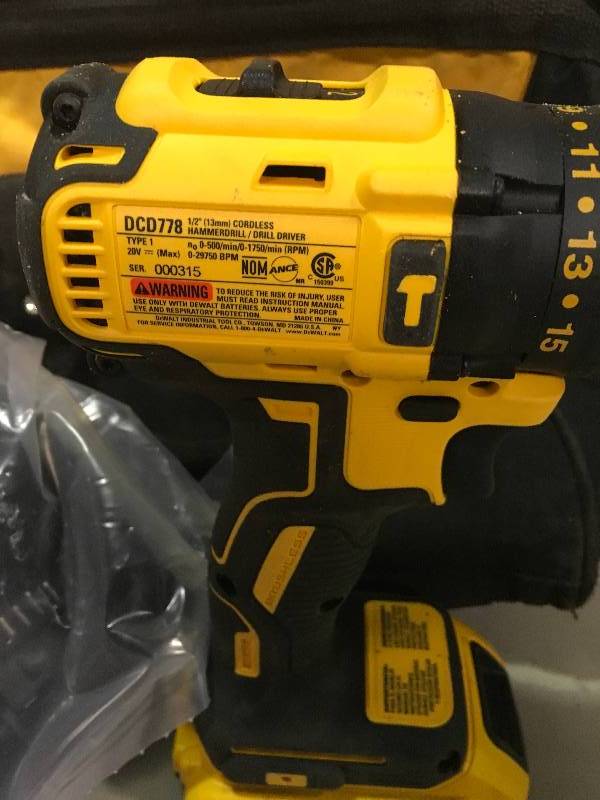 lot 84 image: DEWALT 20-Volt MAX Lithium-Ion Cordless Brushless 12 in. Compact Hammer Drill with Battery 3.0Ah, Charger and Contractor Bag Used in good working cond.