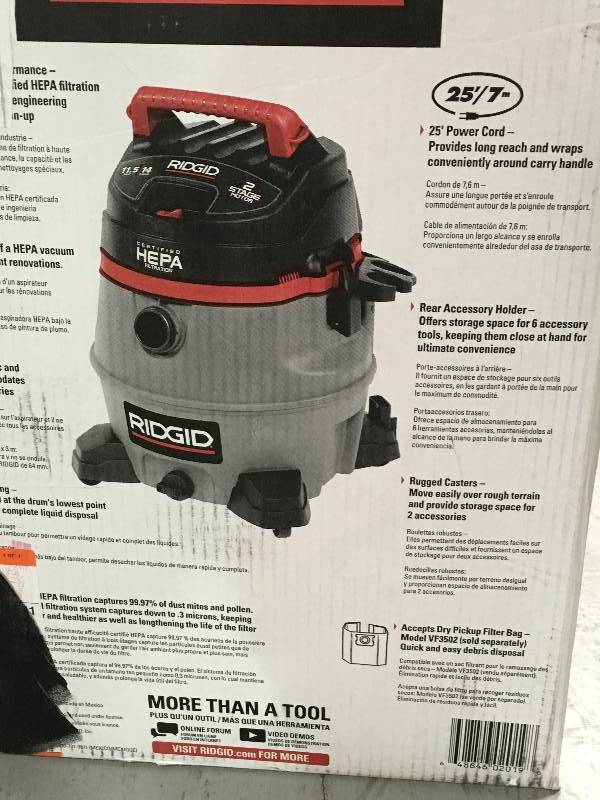 lot 100 image: Ridgid   14 gal. HEPA Wet Dry Vac in good conditions
