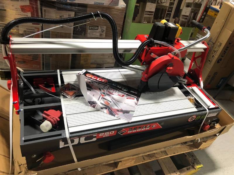 lot 17 image: Rubi 10 in. 120-Volt Tile Saw DC 38 in. NOT USED